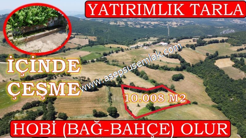 10.008 m2 Yatırımlık Tarla Bağ-Bahçe Su Çeşme Var. Yolu Yok.